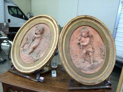 Lolo French Antiques pair of cherub terra cotta plaques
