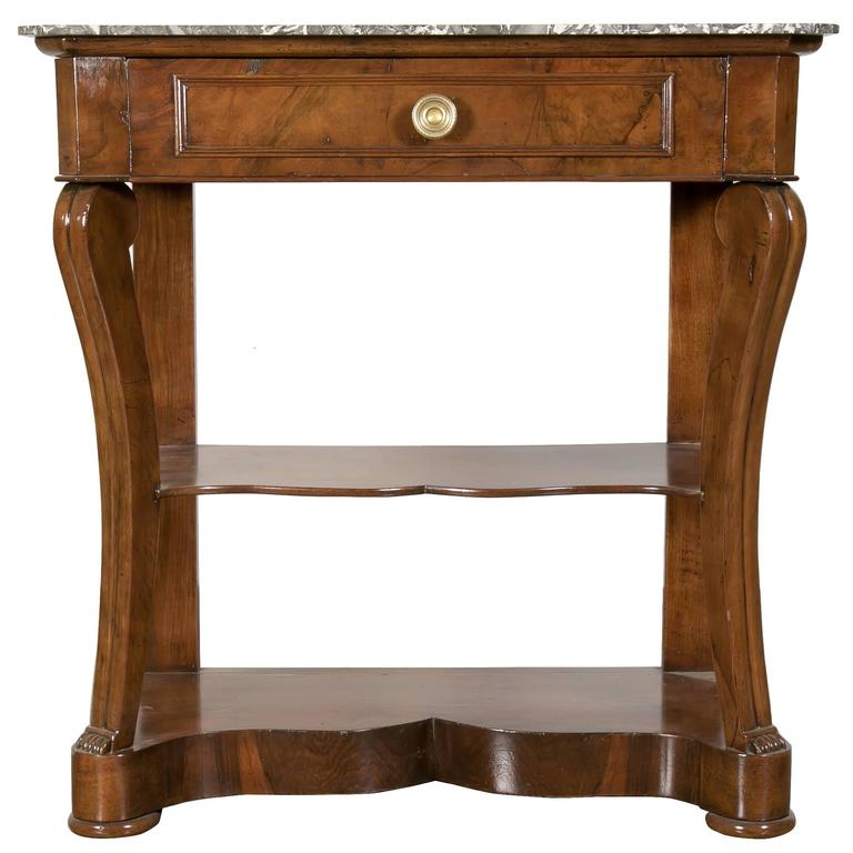 Lolo French Antiques Early 19th Century Charles X Walnut Console with Marble Top and Shelf
